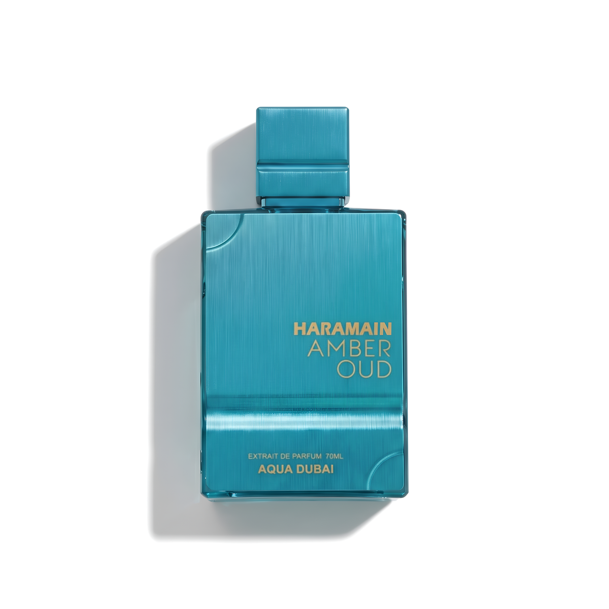 Bottle of Al Haramain Amber Oud Aqua Dubai Extrait fragrance on a white background with soft shadow