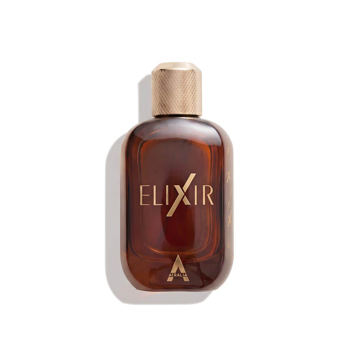 Bottle of Atralia Elixir fragrance on a white background with soft shadow