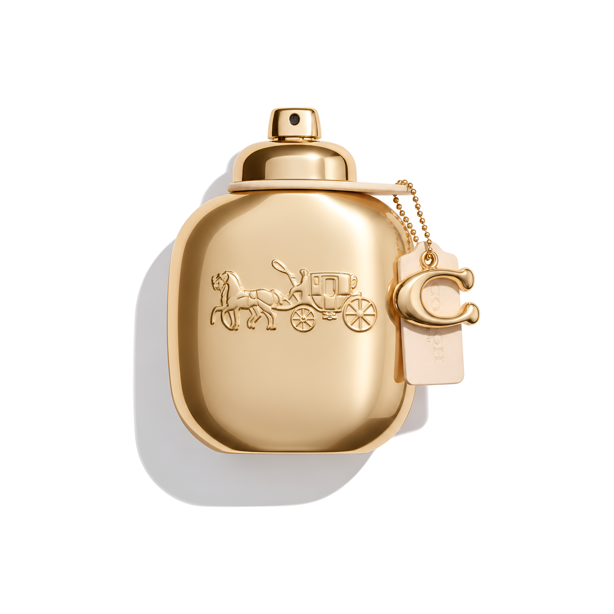 Bottle of Coach Gold Parfum fragrance on a white background with soft shadow