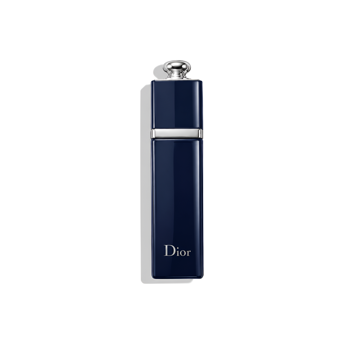 Bottle of Dior Addict EDP fragrance on a white background with soft shadow