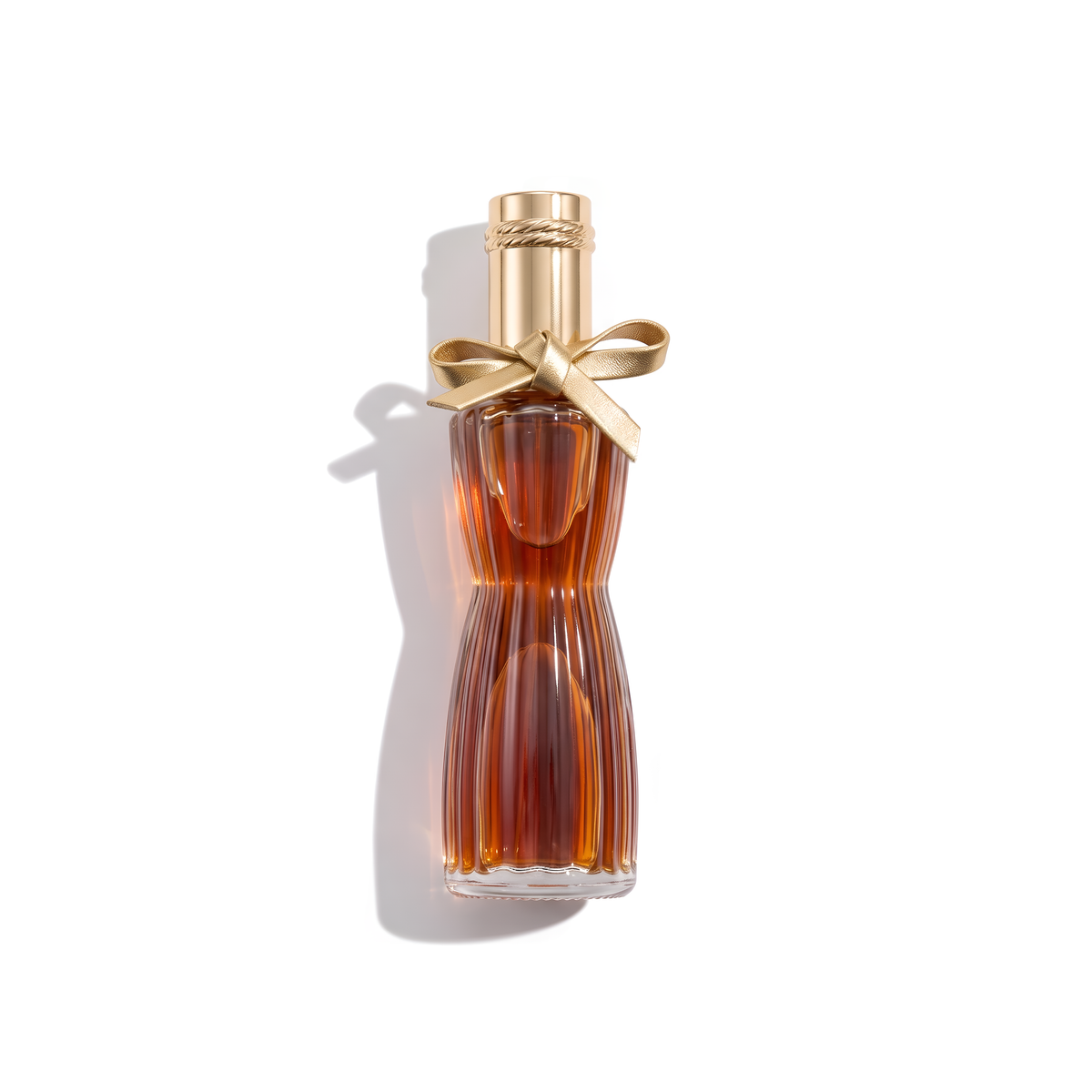 Bottle of Estée Lauder Youth Dew EDP fragrance on a white background with soft shadow
