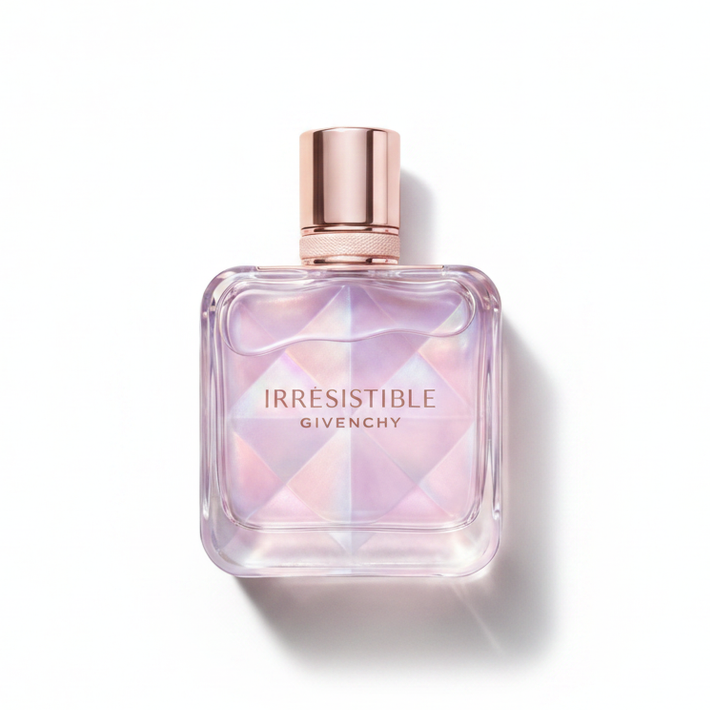 Bottle of Givenchy Irresistible Nectar fragrance on a white background with soft shadow
