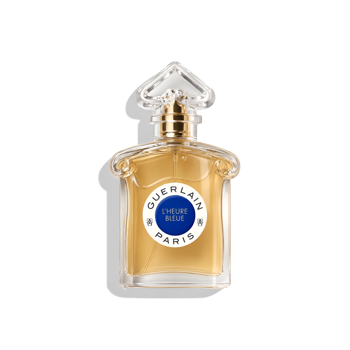 Bottle of Guerlain L'Heure Bleue EDP fragrance on a white background with soft shadow
