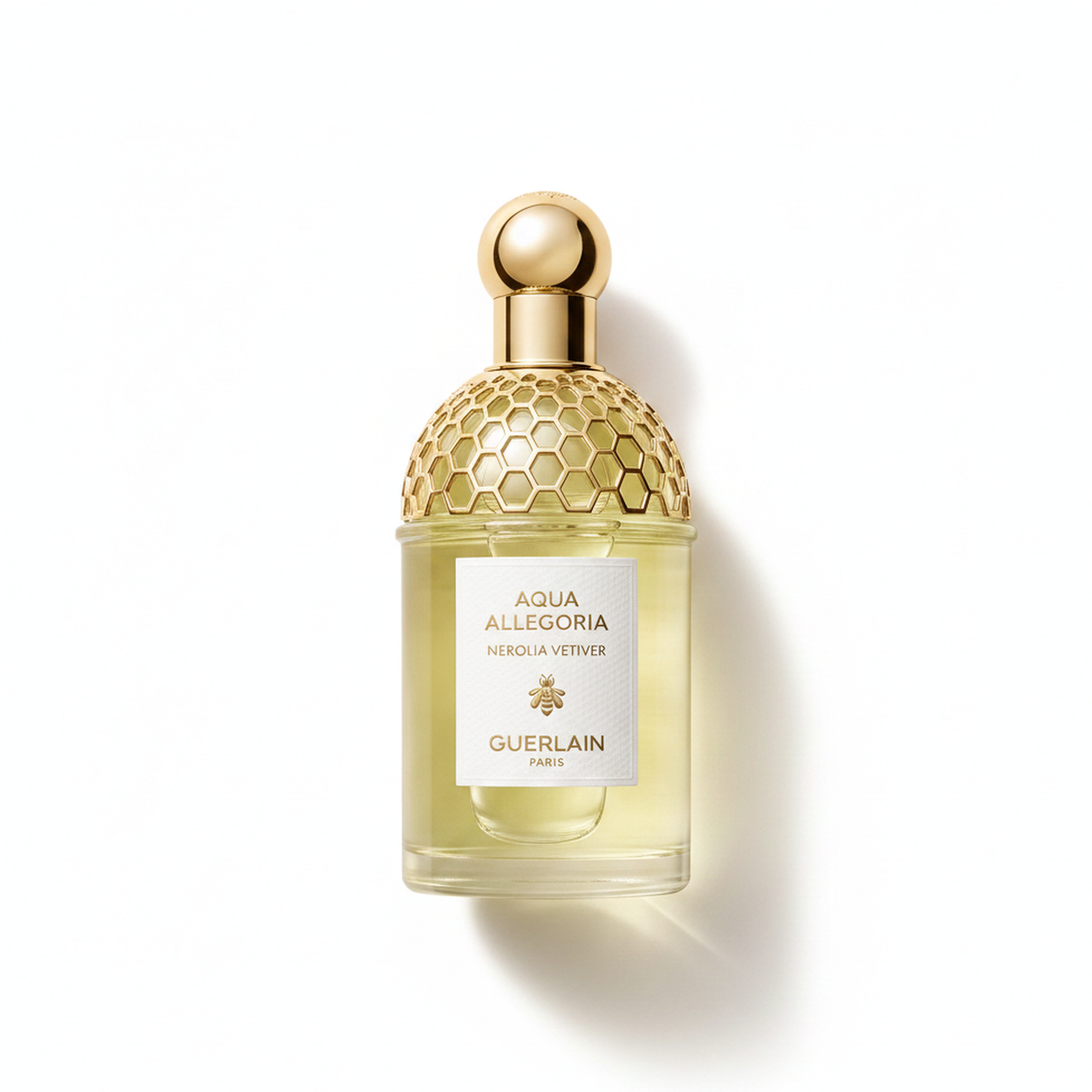 Bottle of Guerlain Nerolia Vetiver Forte EDP fragrance on a white background with soft shadow