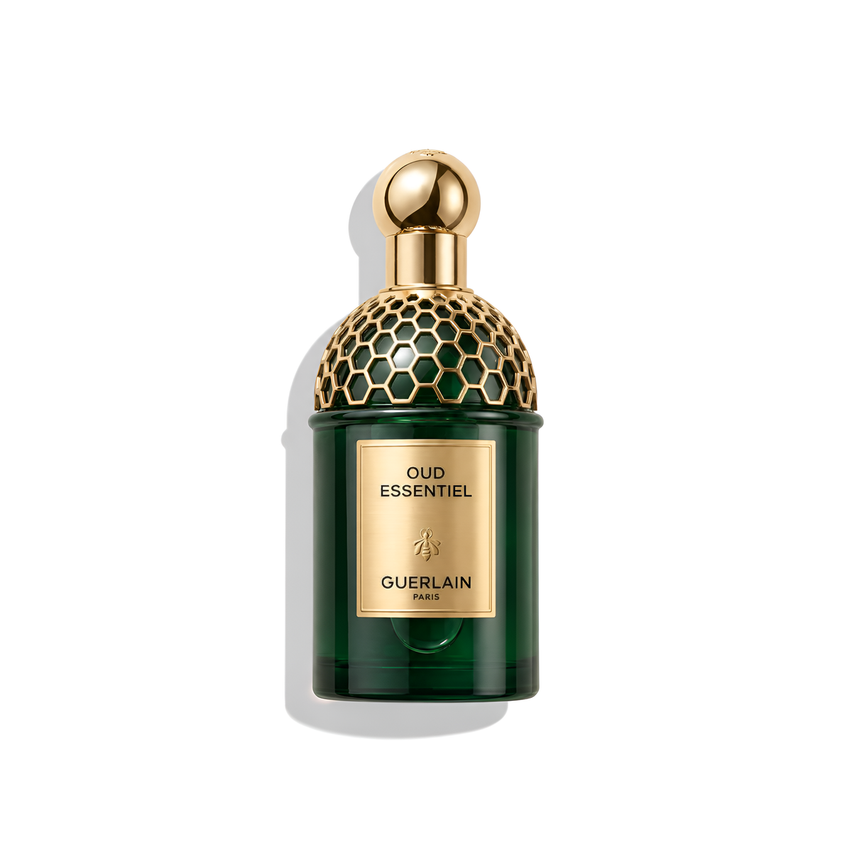 Bottle of Guerlain Oud Essentiel EDP fragrance on a white background with soft shadow