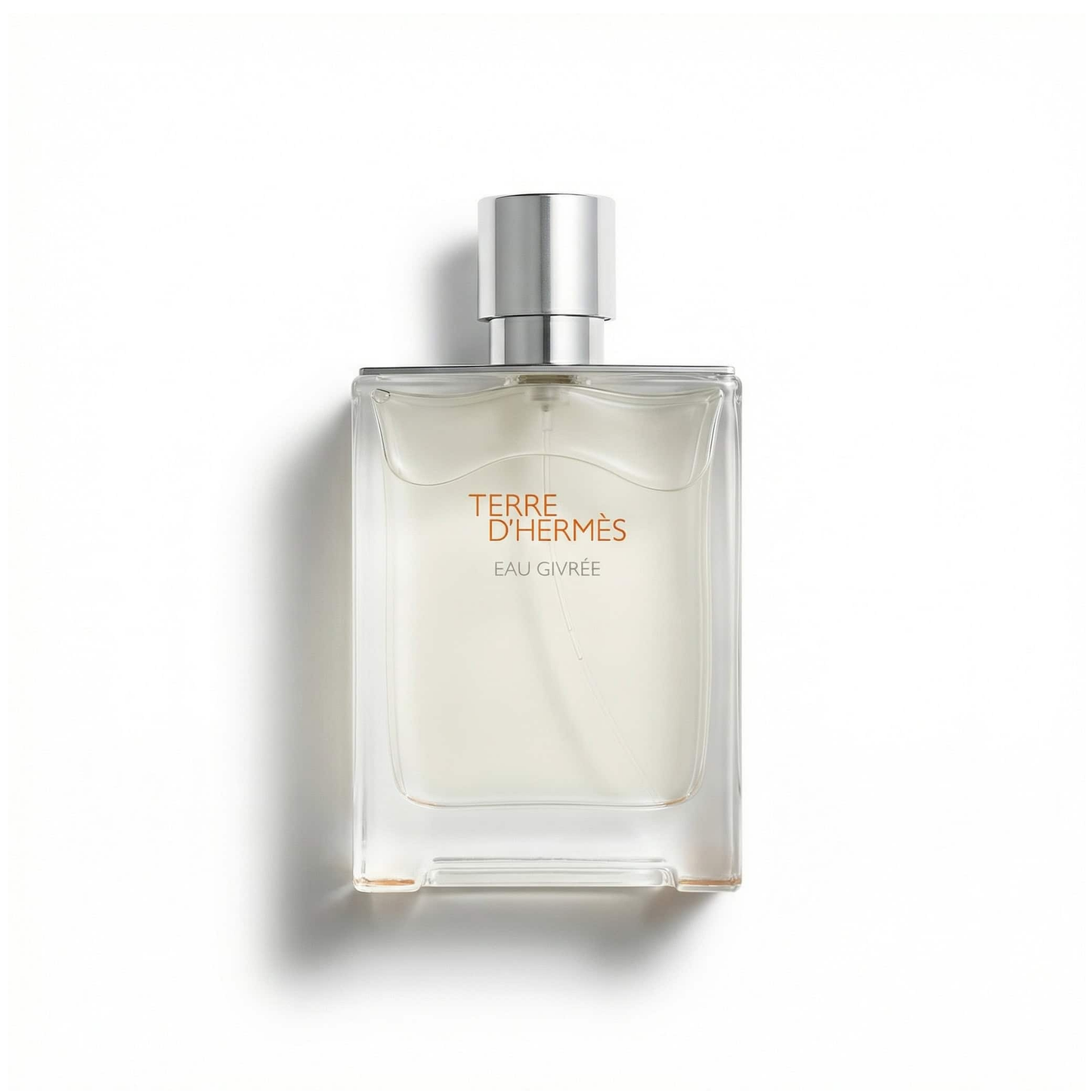 Bottle of Hermes Terre D’Hermes Eau Givree EDP fragrance on a white background with soft shadow