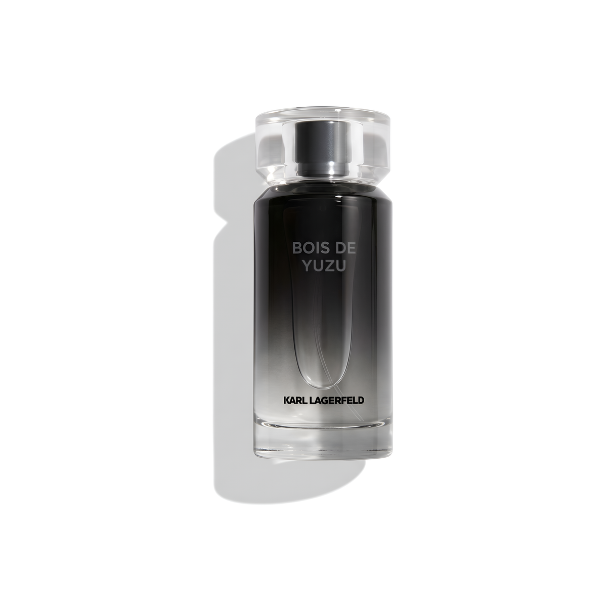 Bottle of Karl Lagerfeld Bois de Yuzu EDT fragrance on a white background with soft shadow