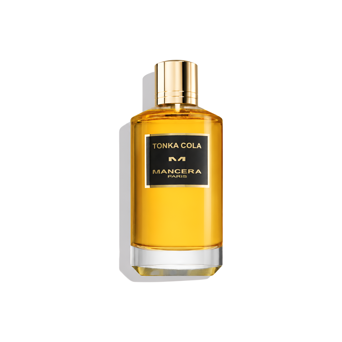 Bottle of Mancera Tonka Cola EDP fragrance on a white background with soft shadow