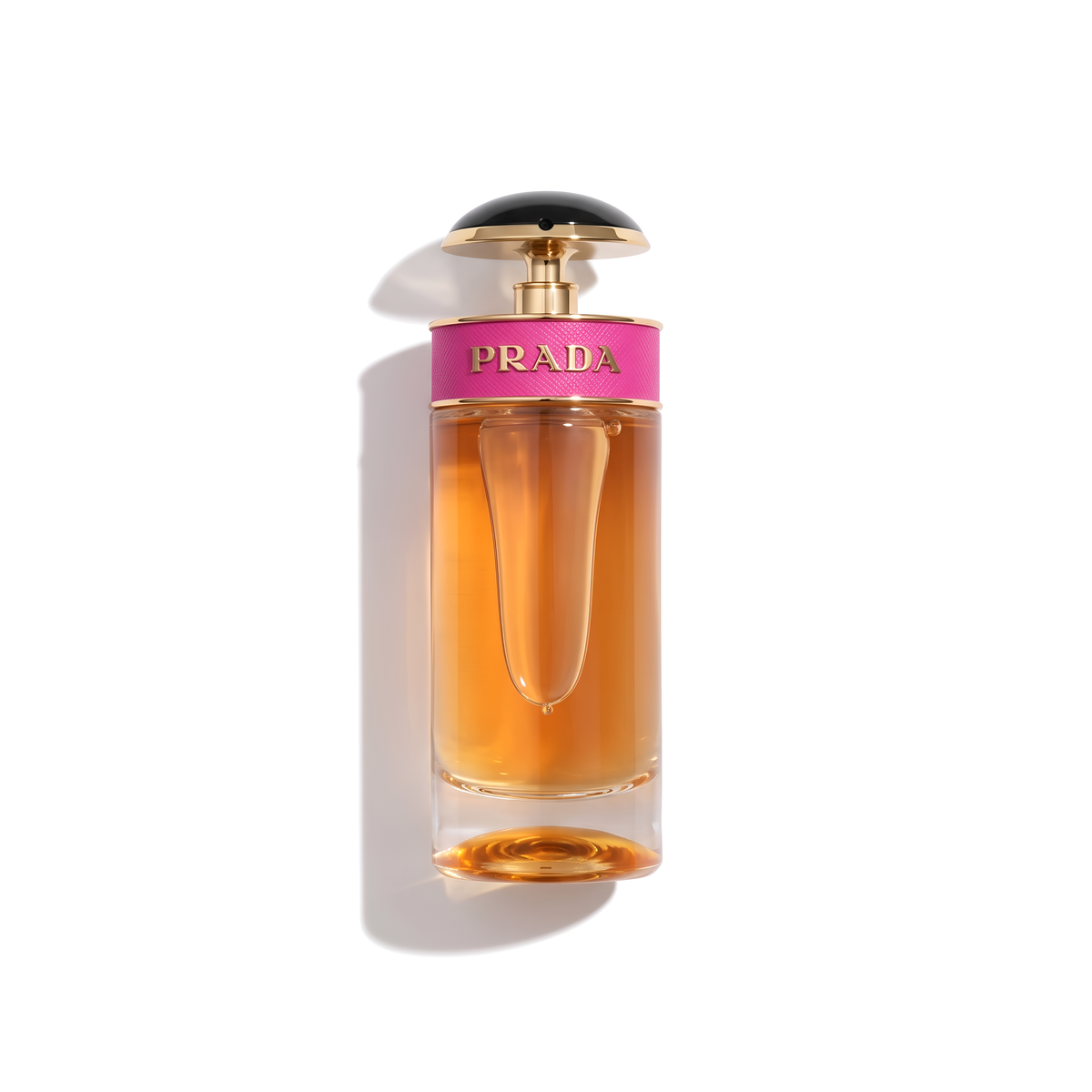 Bottle of Prada Candy EDP fragrance on a white background with soft shadow
