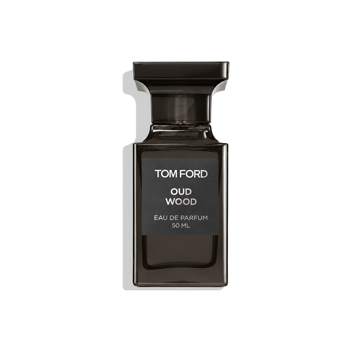 Bottle of Tom Ford Oud Wood EDP fragrance on a white background with soft shadow