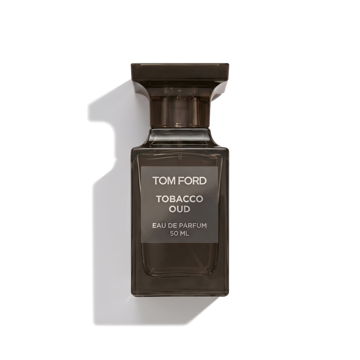 Bottle of Tom Ford Tobacco Oud EDP fragrance on a white background with soft shadow