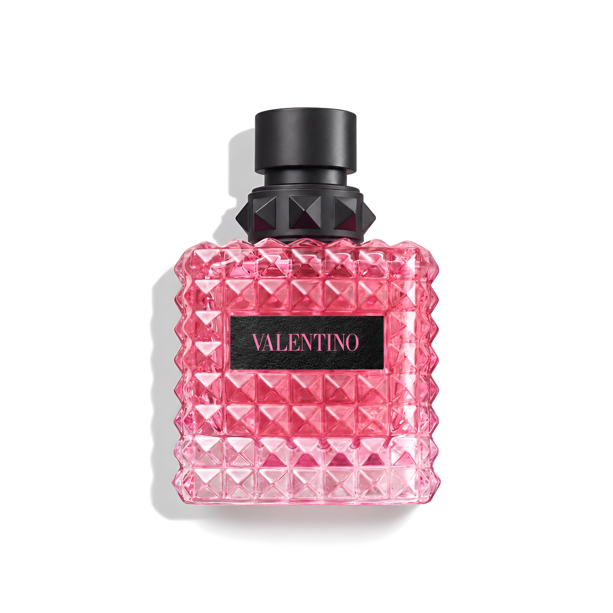 Bottle of Valentino Donna Born In Roma Extradose Parfum fragrance on a white background with soft shadow