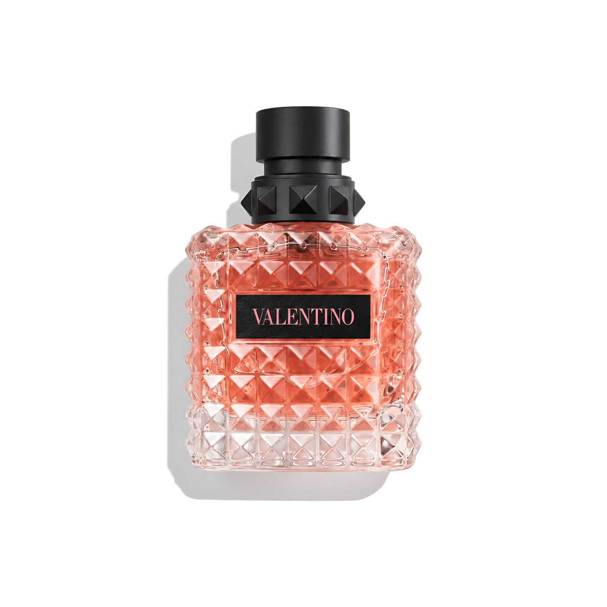 Bottle of Valentino Donna Born in Roma EDP fragrance on a white background with soft shadow