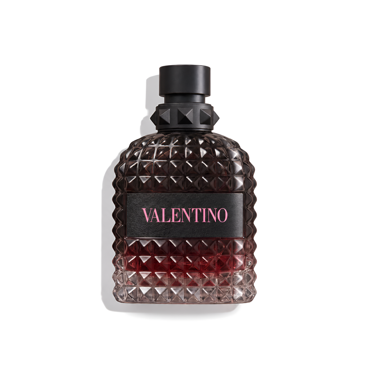 Bottle of Valentino Uomo Born In Roma Intense EDP fragrance on a white background with soft shadow