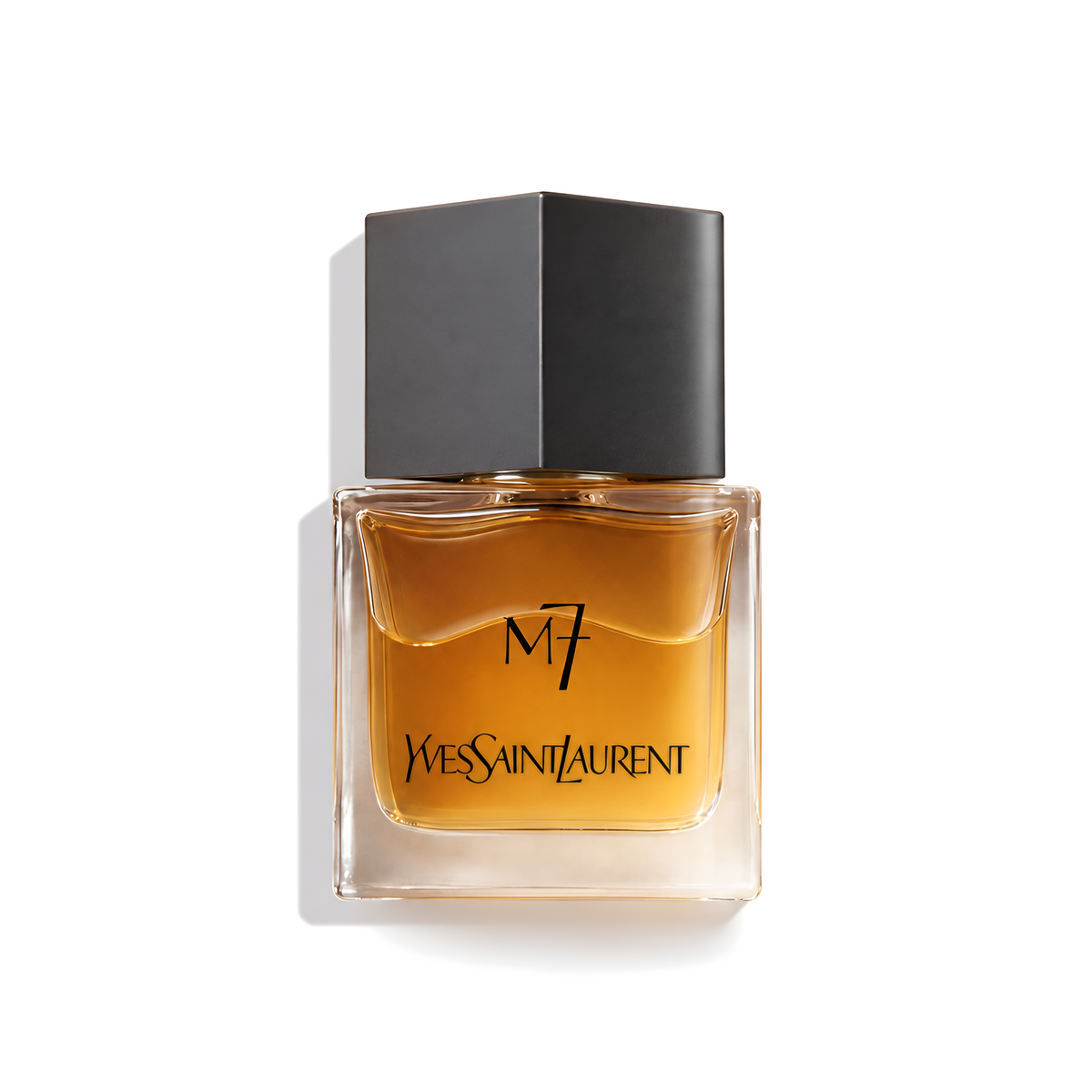 Bottle of YSL M7 EDT fragrance on a white background with soft shadow
