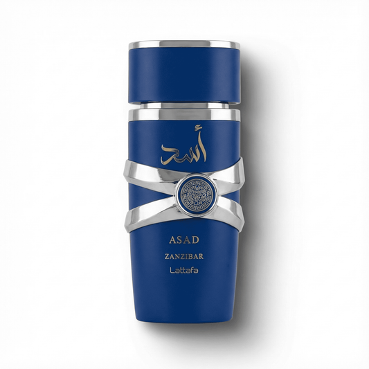 Luxurious blue bottle of Asad Zanzibar Attar with elegant silver accents and Arabic calligraphy.