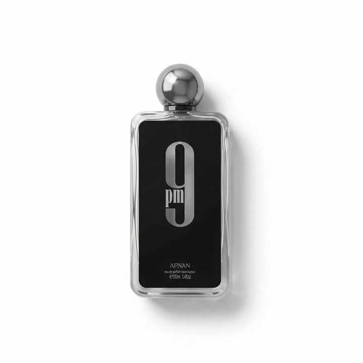 Bottle of Afnan 9PM EDP fragrance on a white background with soft shadow