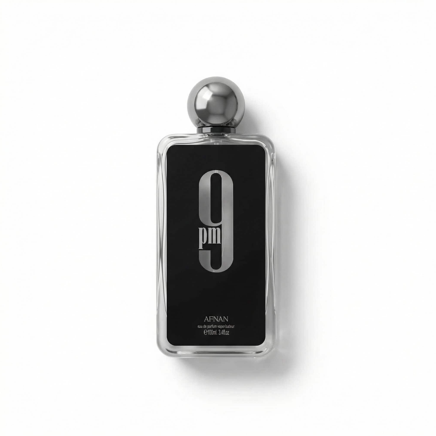 Bottle of Afnan 9PM EDP fragrance on a white background with soft shadow