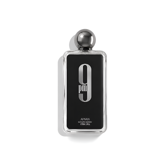 Bottle of Afnan 9PM EDP fragrance on a white background with soft shadow
