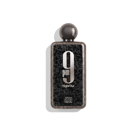 Bottle of Afnan 9PM Nightout Extrait fragrance on a white background with soft shadow
