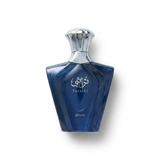 Bottle of Afnan Turathi Blue EDP fragrance on a white background with soft shadow