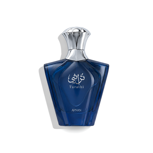 Bottle of Afnan Turathi Blue EDP fragrance on a white background with soft shadow