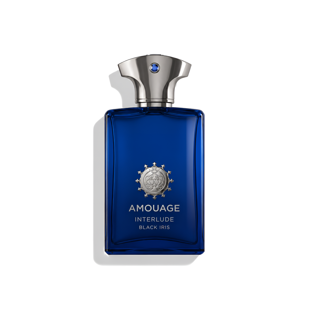 Bottle of Amouage Interlude Black Iris EDP fragrance on a white background with soft shadow