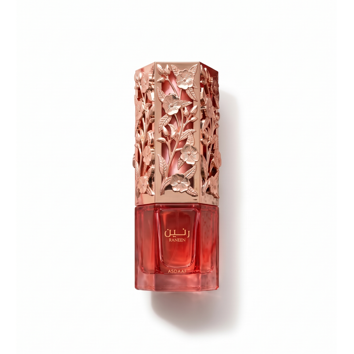 Bottle of Asdaaf Raneen EDP fragrance on a white background with soft shadow