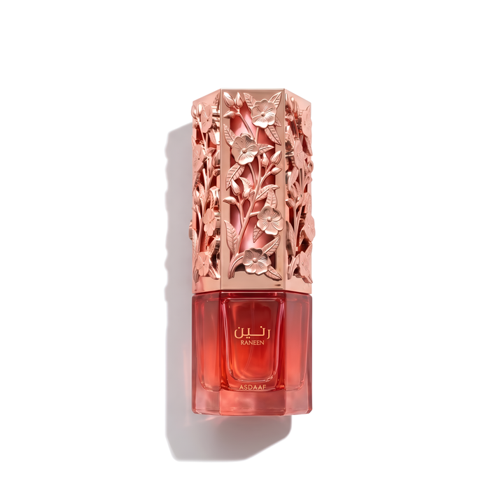 Bottle of Asdaaf Raneen EDP fragrance on a white background with soft shadow