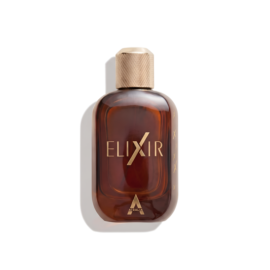 Bottle of Atralia Elixir fragrance on a white background with soft shadow