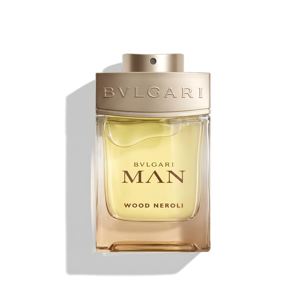 Bottle of Bvlgari Wood Neroli EDP fragrance on a white background with soft shadow