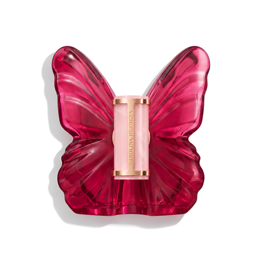 Bottle of Carolina Herrera La Bomba EDP fragrance on a white background with soft shadow