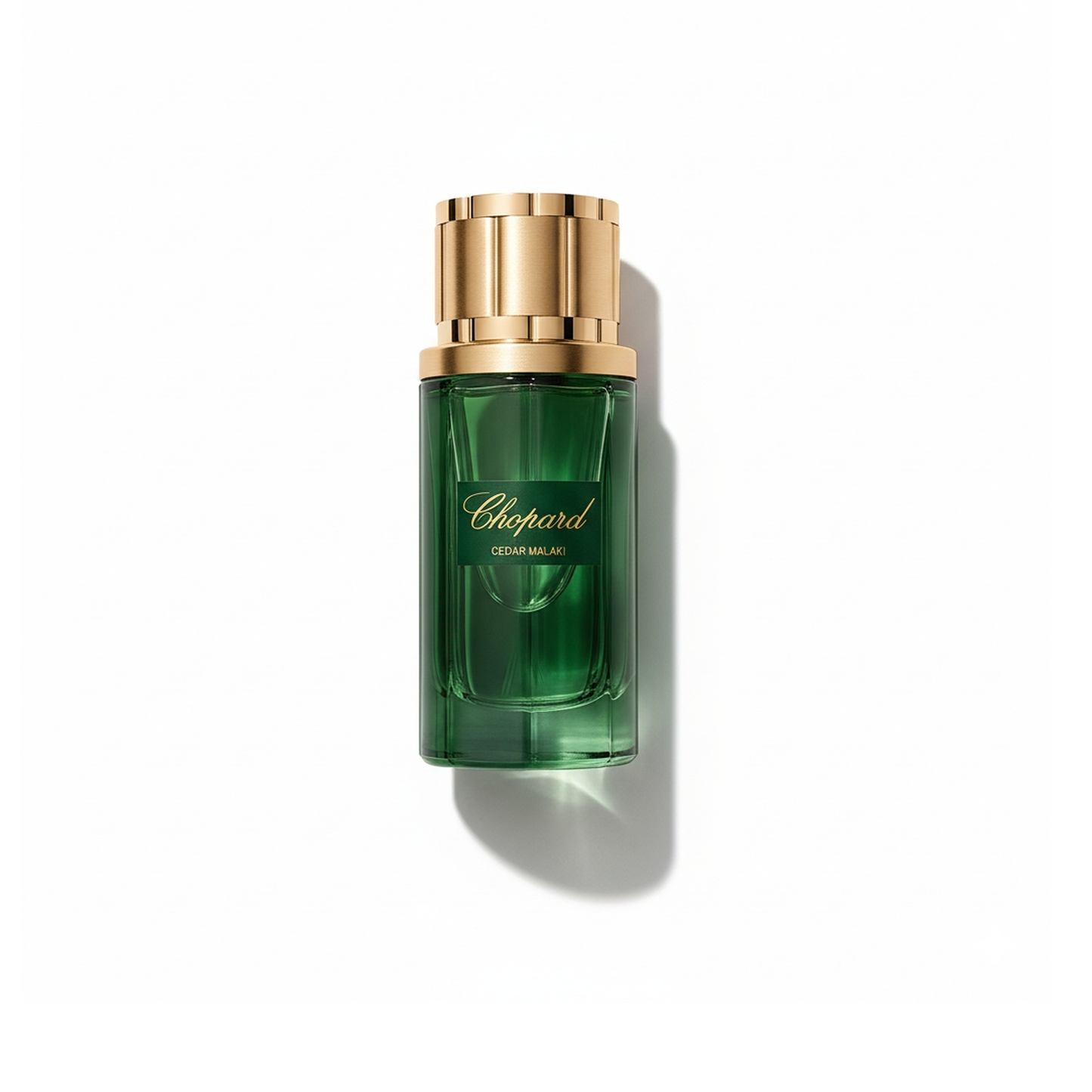 Bottle of Chopard Cedar Malaki EDP fragrance on a white background with soft shadow