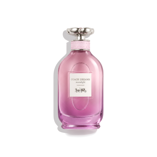 Bottle of Coach Dreams Moonlight EDP fragrance on a white background with soft shadow