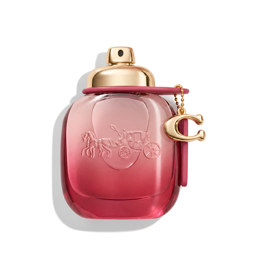 Bottle of Coach Wild Rose EDP fragrance on a white background with soft shadow