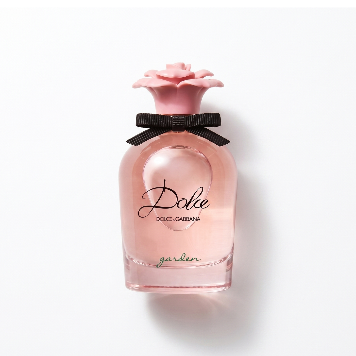 Bottle of Dolce Garden EDP fragrance on a white background with soft shadow