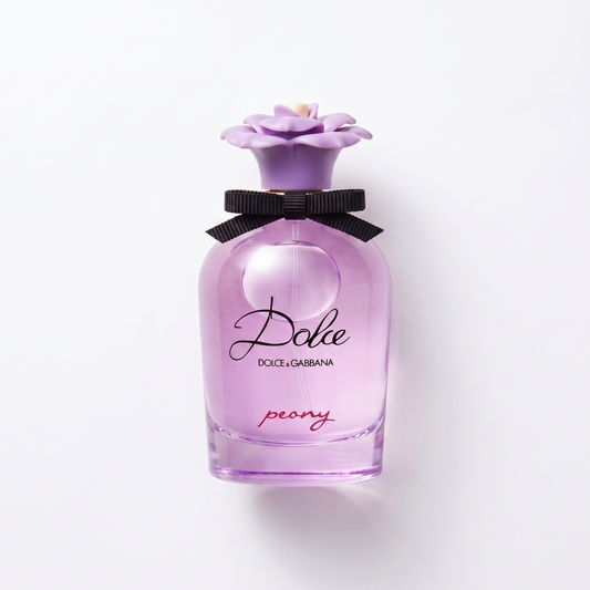 Bottle of Dolce Peony EDP fragrance on a white background with soft shadow