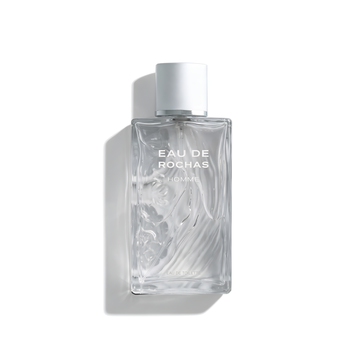 Bottle of Eau de Rochas EDT fragrance on a white background with soft shadow