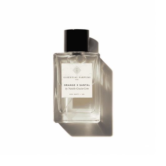 Bottle of Essential Parfums Orange x Santal EDP fragrance on a white background with soft shadow
