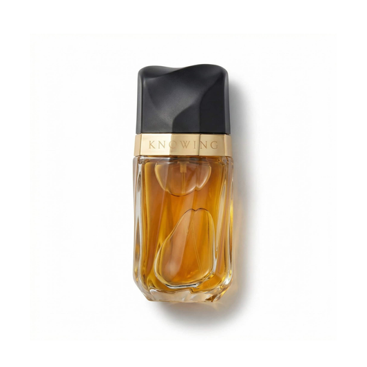 Bottle of Estée Lauder Knowing EDP fragrance on a white background with soft shadow
