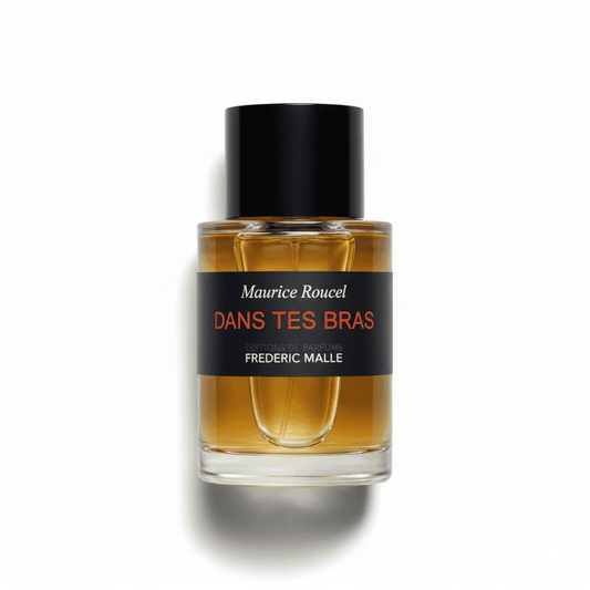 Bottle of Frederic Malle Dans Tes Bras EDP fragrance on a white background with soft shadow