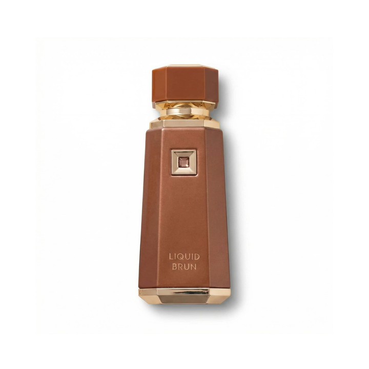 Bottle of French Avenue Liquid Brun EDP fragrance on a white background with soft shadow