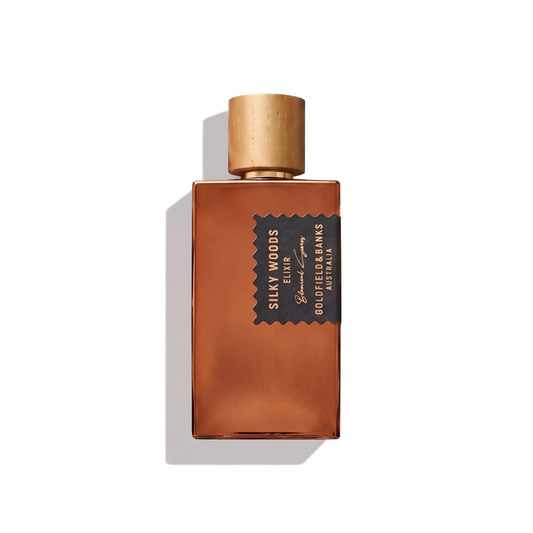 Bottle of Goldfield & Banks Silky Woods Elixir fragrance on a white background with soft shadow