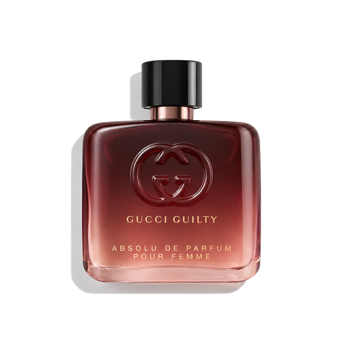Bottle of Gucci Guilty Pour Femme Absolu De Parfum fragrance on a white background with soft shadow