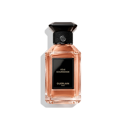 Bottle of Guerlain Fève Gourmande EDP fragrance on a white background with soft shadow