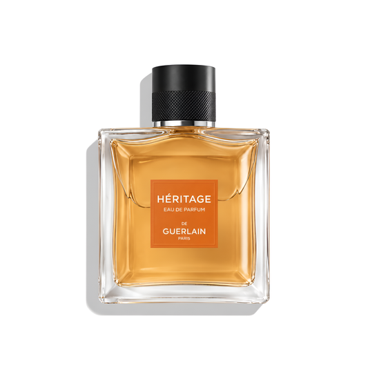 Bottle of Guerlain Heritage EDP fragrance on a white background with soft shadow