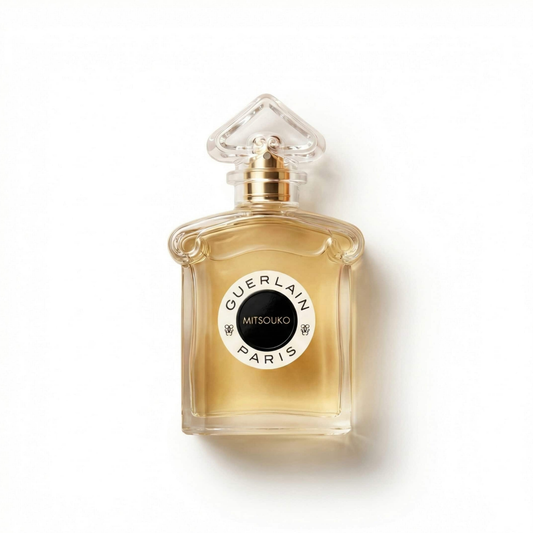 Bottle of Guerlain Mitsouko EDP fragrance on a white background with soft shadow