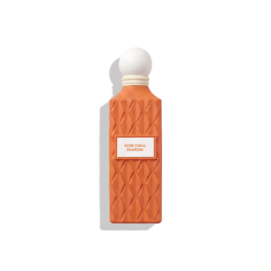 Bottle of Ibraheem Al Qurashi Nude Coral Diamond EDP fragrance on a white background with soft shadow