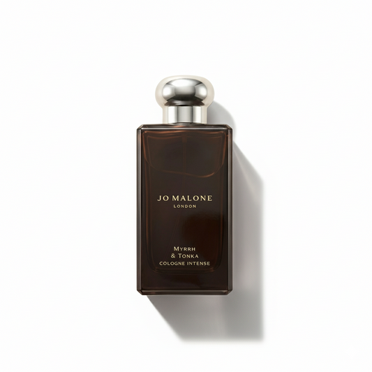 Bottle of Jo Malone Myrrh & Tonka Cologne Intense fragrance on a white background with soft shadow