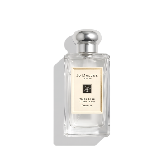 Bottle of Jo Malone Wood Sage & Sea Salt Cologne fragrance on a white background with soft shadow